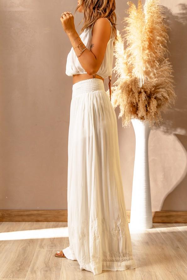 Bele hlače z zgornjim delom in z V izrezom Hedda