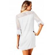 Bela tunika Zara s pomponi na obrobju