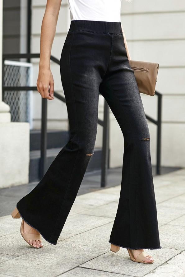 Črne kavbojke na zvonec z zarezo v kolenih Lyla