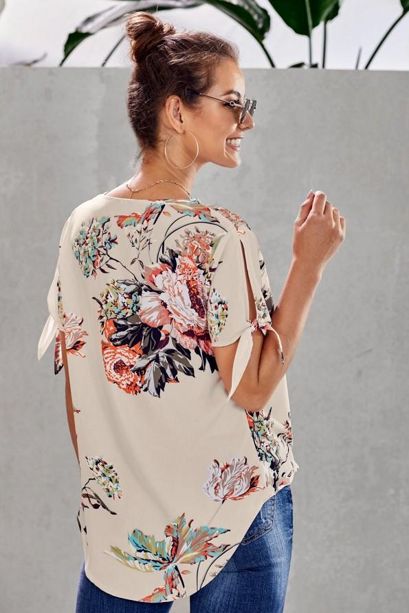 Preklopna bluza Mae marelične barve s cvetličnim potiskom