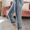 Zavihane raztrgane bombažne jeans hlače
