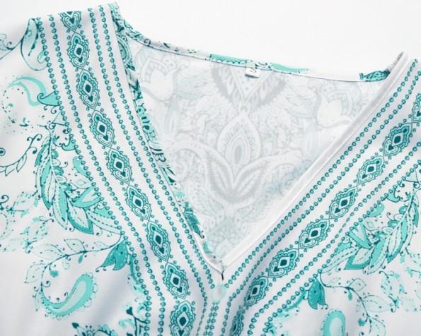 Zelena ohlapna  obleka z V-izrezom s polovičnimi rokavi in s cvetličnim tiskom Emery