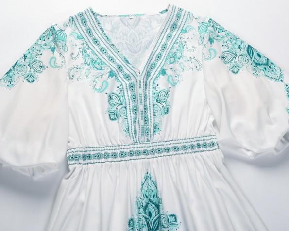 Zelena ohlapna  obleka z V-izrezom s polovičnimi rokavi in s cvetličnim tiskom Emery