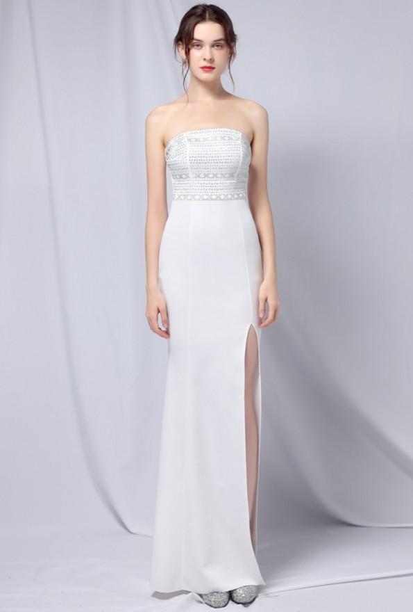 Bela večerna in poročna obleka brez naramnic z zgornjimi režami Donna