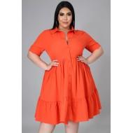 Oranžna drsalna obleka za močnejše postave Inna