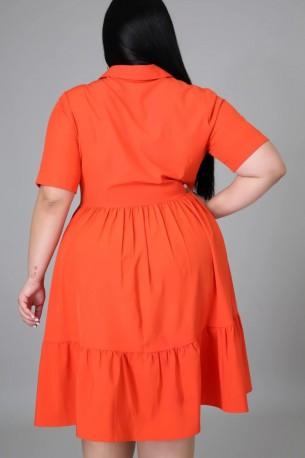 Oranžna drsalna obleka za močnejše postave Inna