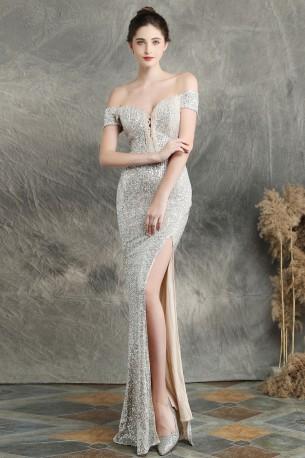 Večerna srebrna obleka z bleščicami in s spodnjim izrezom Danna